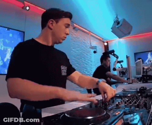 Man In Black Shirt Playing DJ Set GIF