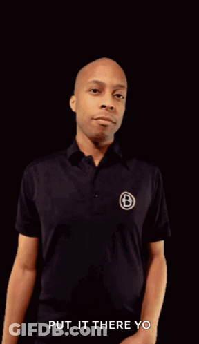 Man In Black Shirt Pointing Fist Put It There Yo GIF