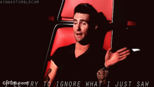 Man In Black Shirt Red Chair Hands Outstretched GIF