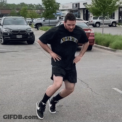 Man In Black Shirt Saying Amarillo Running GIF