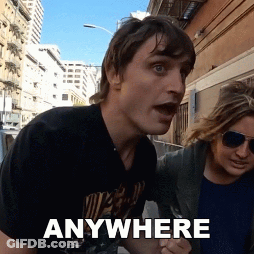 Man In Black Shirt Saying Anywhere GIF