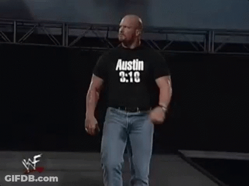 Man In Black Shirt Saying Austin 3:16 Walking Down Stage GIF