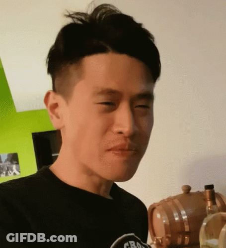 Man In Black Shirt Saying Crouching Tigers GIF