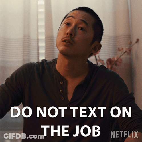 Man In Black Shirt Saying Do Not Text On The Job GIF
