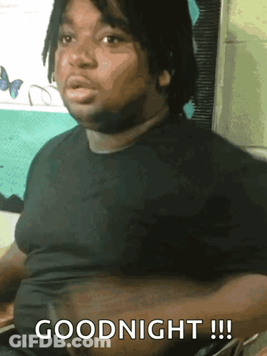 Man In Black Shirt Saying Goodnight GIF