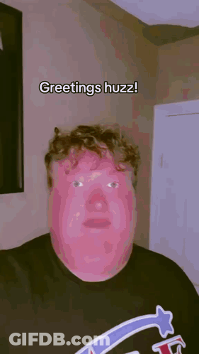 Man In Black Shirt Saying Greetings Huzz GIF