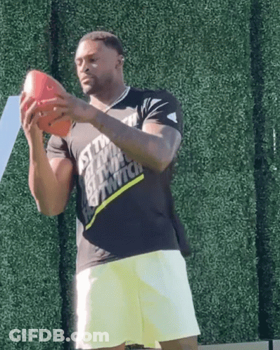 Man In Black Shirt Saying Just Do It Holds Football GIF