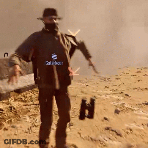 Man In Black Shirt Saying Katarkeur Holding Gun And Binoculars GIF