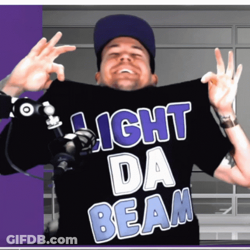 Man In Black Shirt Saying Light Da Beam GIF