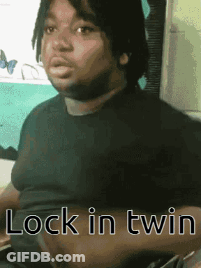 Man In Black Shirt Saying Lock In Twin GIF