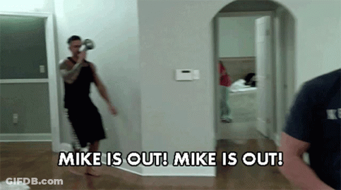 Man In Black Shirt Saying Mike Is Out GIF