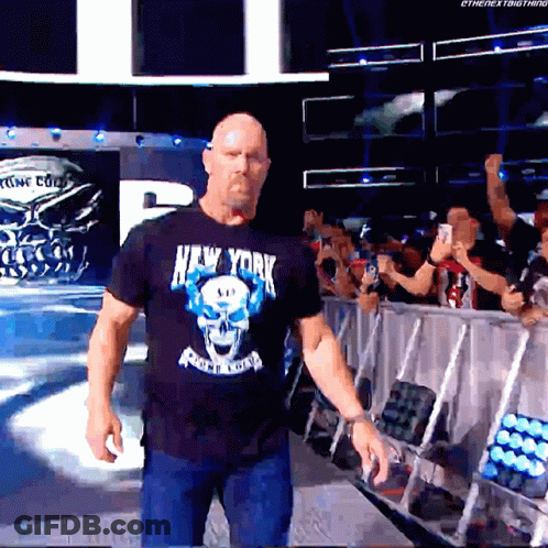 Man In Black Shirt Saying New York Walking On Stage GIF