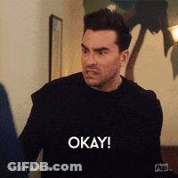 Man In Black Shirt Saying Okay GIF