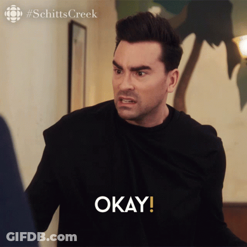 Man In Black Shirt Saying Okay Schitts Creek Logo GIF