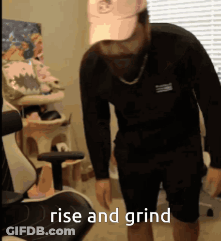 Man In Black Shirt Saying Rise And Grind GIF