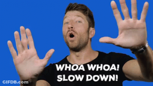 Man In Black Shirt Saying Whoa Whoa Slow Down GIF