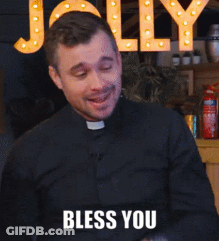 Man In Black Shirt Says Bless You GIF