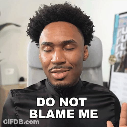 Man In Black Shirt Says Do Not Blame Me Eyes Closed GIF
