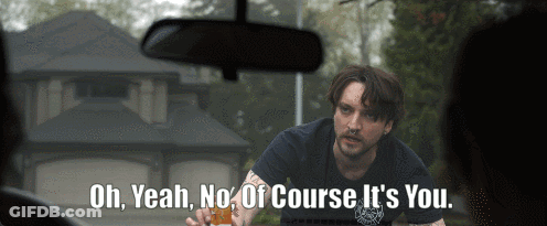 Man In Black Shirt Says Oh Yeah No Of Course It's You In Front Of House GIF