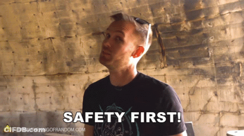 Man In Black Shirt Says Safety First GIF