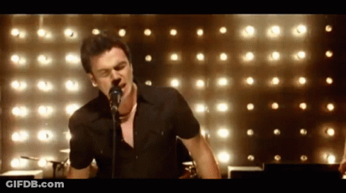 Man In Black Shirt Singing GIF