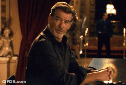 Man In Black Shirt Sitting At Bar GIF