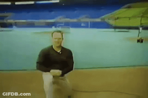 Man In Black Shirt Sitting In Front Of Screen Saying Nu GIF