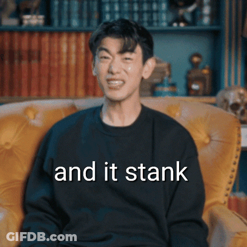 Man In Black Shirt Sitting In Yellow Chair And It Stank GIF
