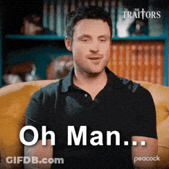 Man In Black Shirt Sitting On Yellow Couch Saying Oh Man GIF