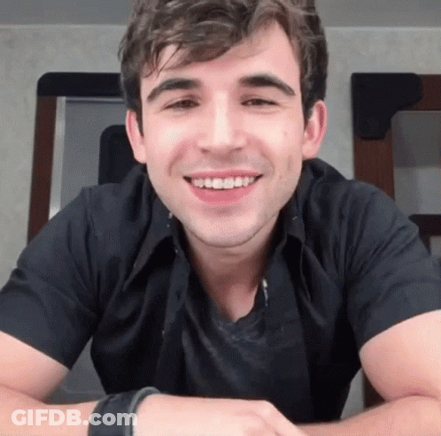 Man In Black Shirt Smiling GIF