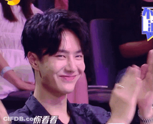 Man In Black Shirt Smiling And Clapping GIF