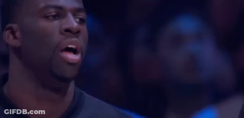 Man In Black Shirt Smiling At Camera GIF