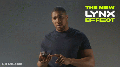 Man In Black Shirt Spraying Lynx Effect GIF