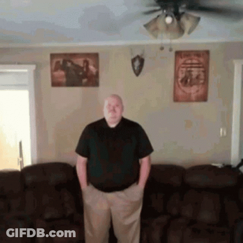 Man In Black Shirt Standing GIF