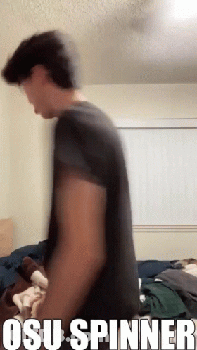 Man In Black Shirt Standing At Window Osu Spinner GIF