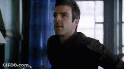 Man In Black Shirt Standing GIF