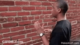 Man In Black Shirt Standing GIF