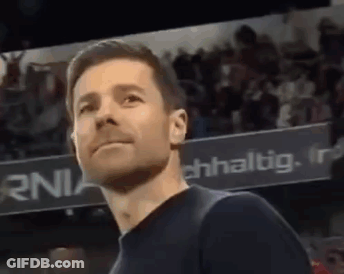 Man In Black Shirt Standing In Stadium GIF