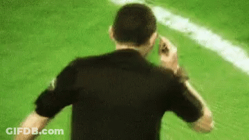 Man In Black Shirt Standing On Field GIF