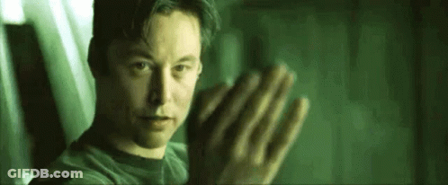 Man In Black Shirt Standing With Outstretched Hands GIF