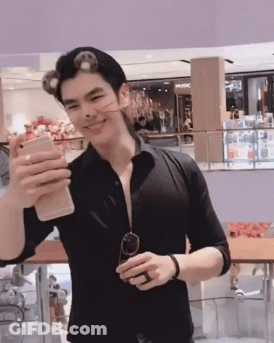 Man In Black Shirt Taking Picture GIF