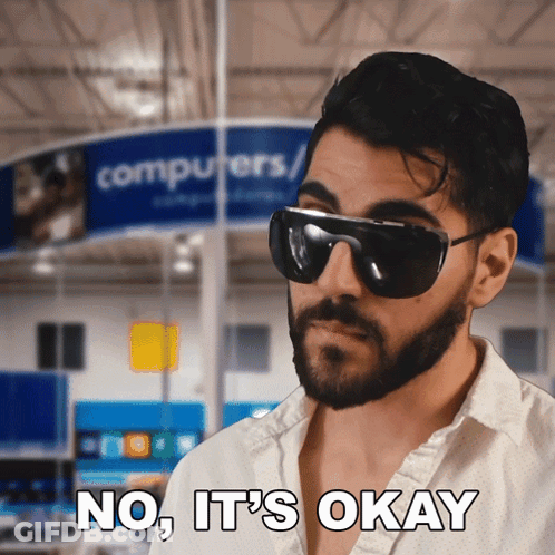 Man In Black Shirt Talking On Phone GIF