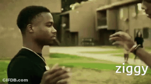 Man In Black Shirt Talking To Ziggy GIF