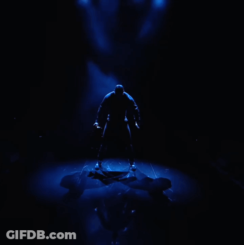 Man In Black Shirt Tie Before Blue Light GIF