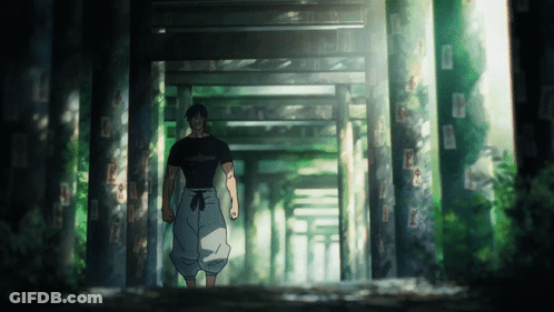 Man In Black Shirt Walking Through Tunnel GIF