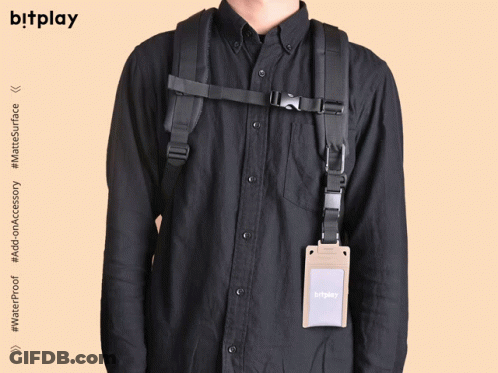 Man In Black Shirt With Backpack And Bitplay Wallet GIF