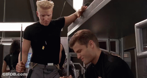 Man In Black Shirt With Badge Saying A GIF