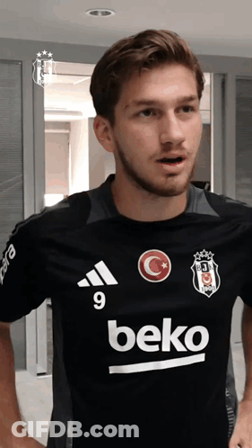 Man In Black Shirt With Beko GIF