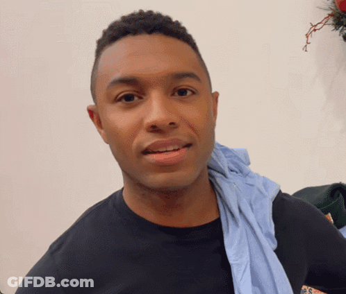 Man In Black Shirt With Blue Towel GIF