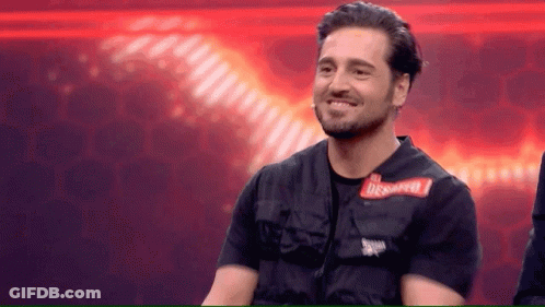 Man In Black Shirt With Bravo Sticker GIF